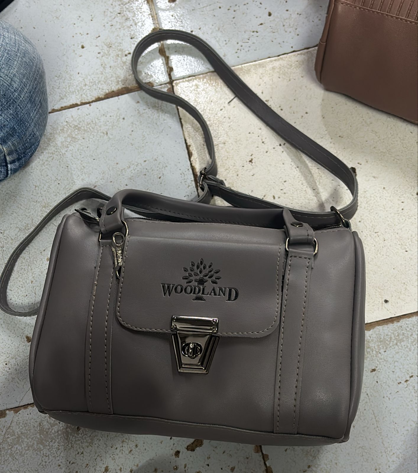 Denion brown PU leather women’s fashion handbag with gold hardware and stitched panel design